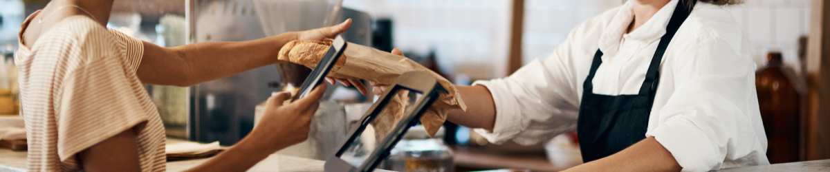 purchasing bread at bakery