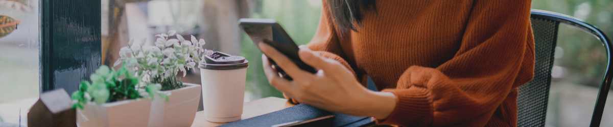 woman texting on cell phone