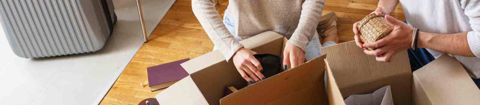 couple unpacking at new home