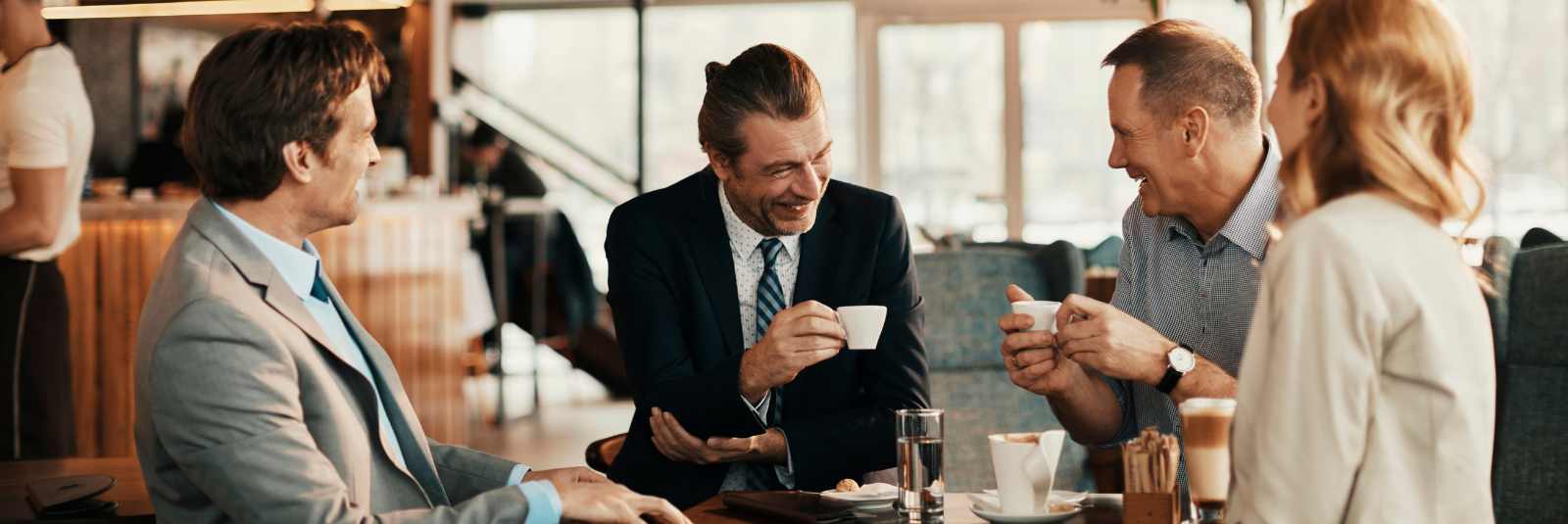 Business people in a meeting with coffee