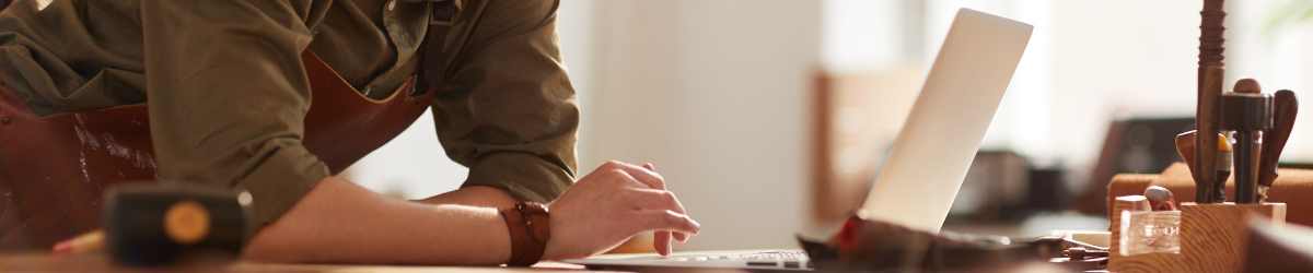 woman on her computer on work station